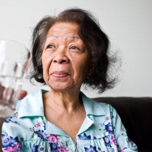 senior_woman_drinking_glass_of_water.