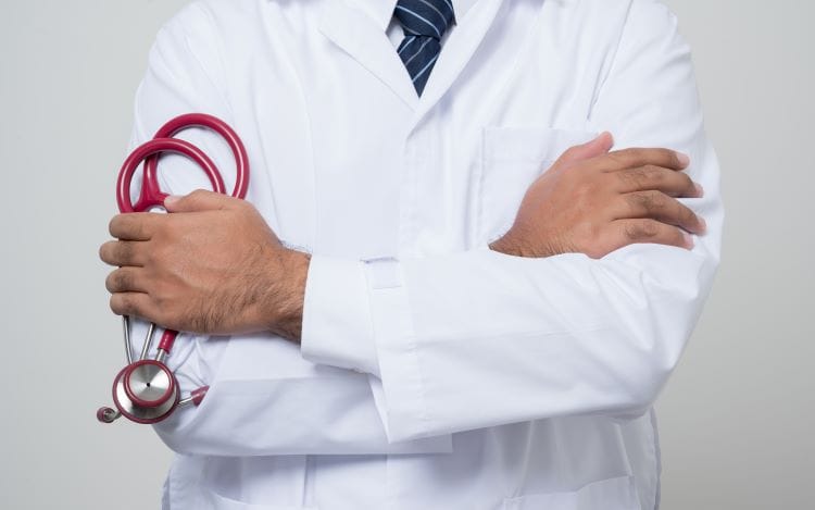 doctor in white coat from Getty Images